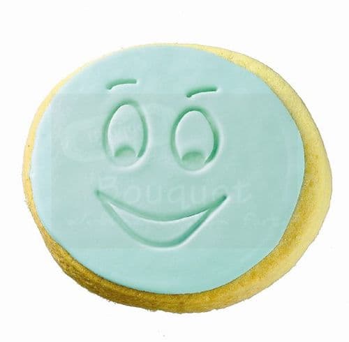 Cookie round with embossed lauphing face / Μπισκότο στρόγγυλο με ανάγλυφη γελαστή φατσούλα